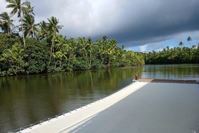 Apetahi day trip around Raiatea on a modern outrigger canoe - The west coast portion: guided pacing and big-sky views